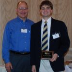 Stephen Crotty (right) stands with his Advisor, Dr. Lawrence F. Kahn (left) while receiving the 2009 Grimm Student Scholarship.