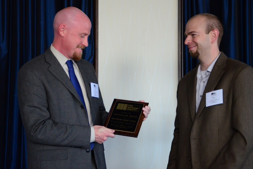Ben Harris (left) accepts the Award from Drew Geister, Chairman of the DPC.