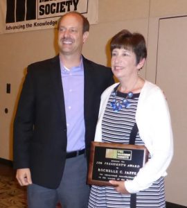 Scott Walkowicz presents the 2014 TMS President's Award to Rochelle C. Jaffe.