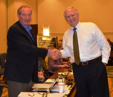 John G. Tawresey was awarded the 2013 President's Award from Russell Brown. 