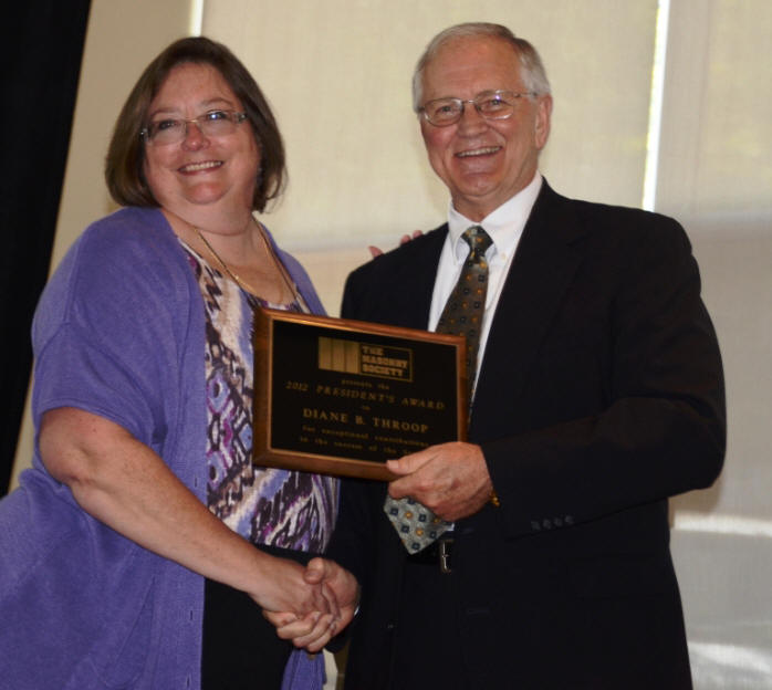Diane Throop was awarded the 2012 President's Award from Russell Brown. 