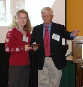 Dr. Jennifer Tanner accepts the 2011 Grimm Student Scholarship on behalf of Sarah Ebright.