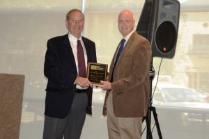 Mr. Tawresey accepts the Haller Award from Ben Harris, Chairman of the DPC.