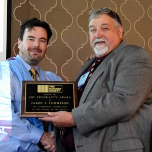 Jason J. Thompson (left) receives 2017 President's Award from Jerry Painter