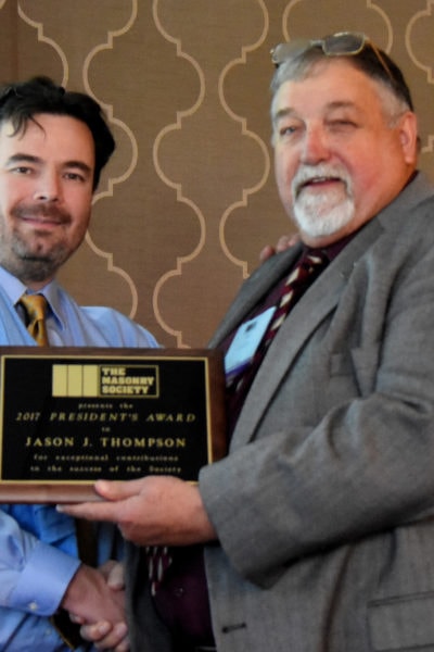 Jason J. Thompson (left) receives 2017 President's Award from Jerry Painter