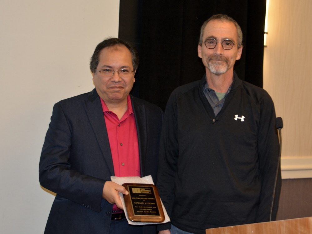 2022 Service Award being presented by Mohamed ElGawdy (left) to Ed Gerns