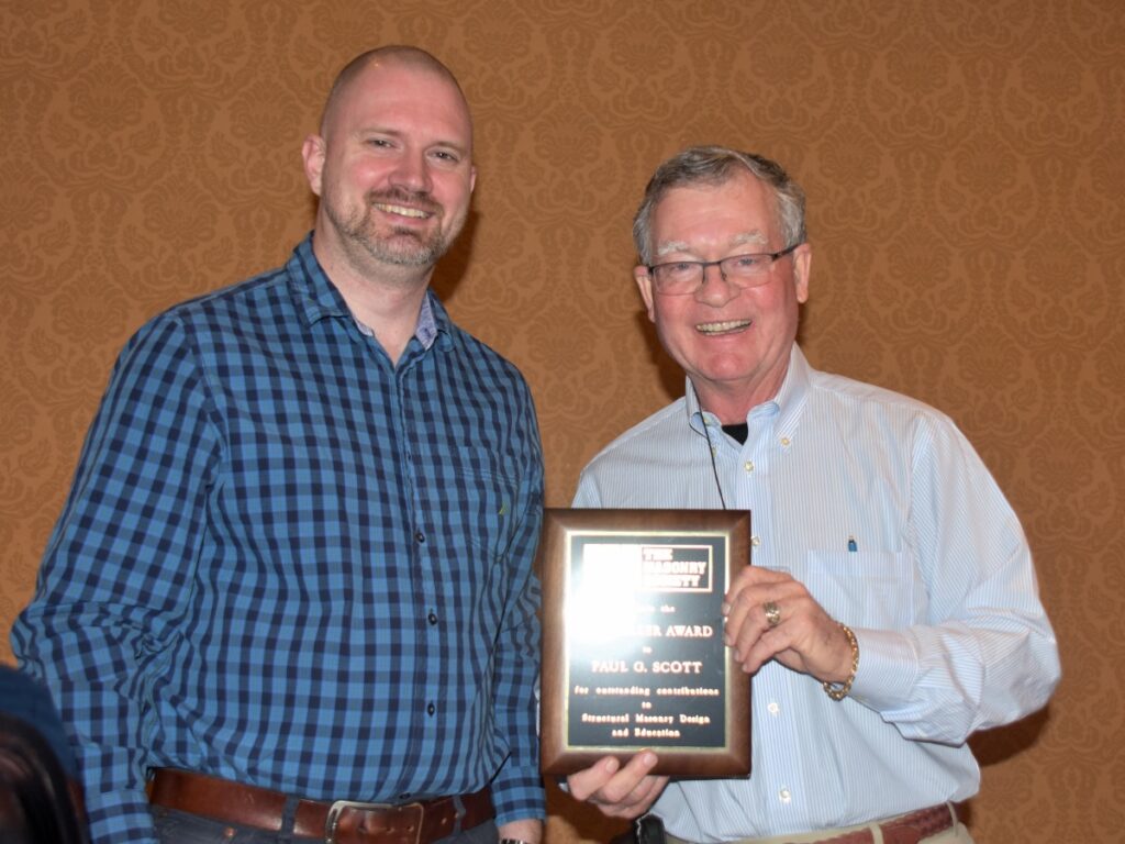 Paul G. Scott (right) receives the 2023 Haller Award from David Sommer, Chair of the Design Practices Committee on behalf of the Haller Award Committee